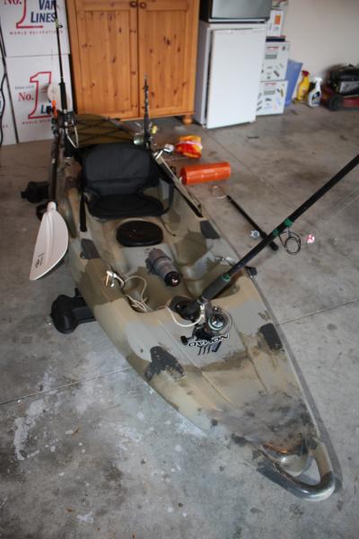 2010 nomad kayak. fitted with 3 rod holders, sea anchor, grapel anchor, berley bomb, fish stringer and rear hatch made from thick perspects painted just to blend in.